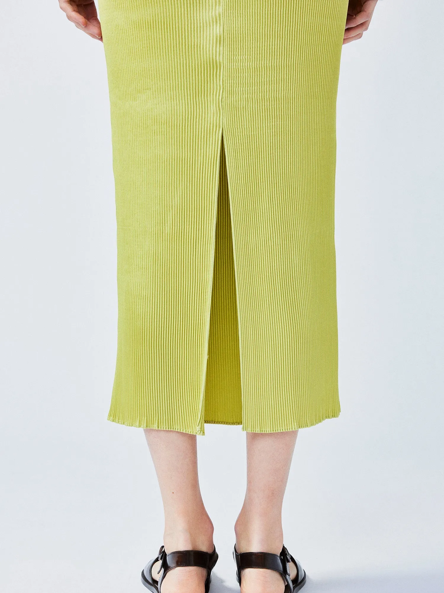 Glamorous and vibrant lime green pleated midi skirt