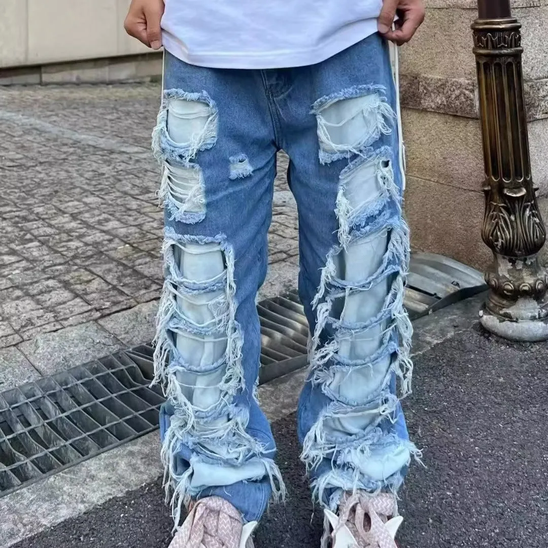 Ripped ripped patch jeans